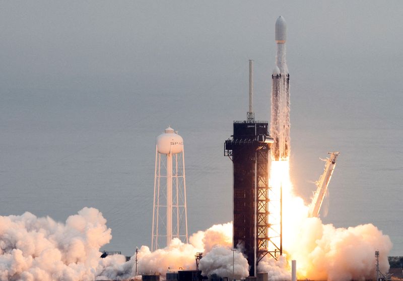 FILE PHOTO: A SpaceX Falcon Heavy rocket lifts off carrying a NASA spacecraft to investigate the Psyche asteroid from the Kennedy Space Center in Cape Canaveral, Florida, U.S., October 13, 2023. REUTERS/Joe Skipper/File Photo