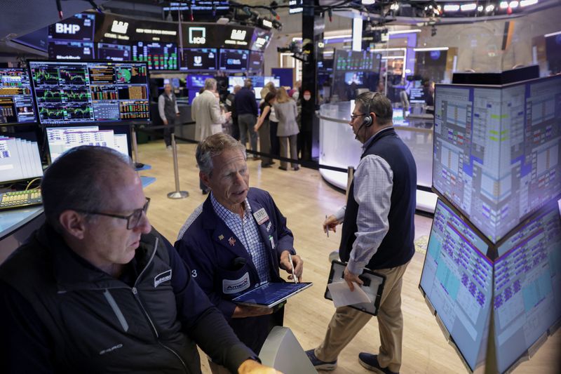 Traders work on the floor at the New York Stock Exchange (NYSE) in New York City, U.S., May 15, 2026. REUTERS/Jeenah Moon
