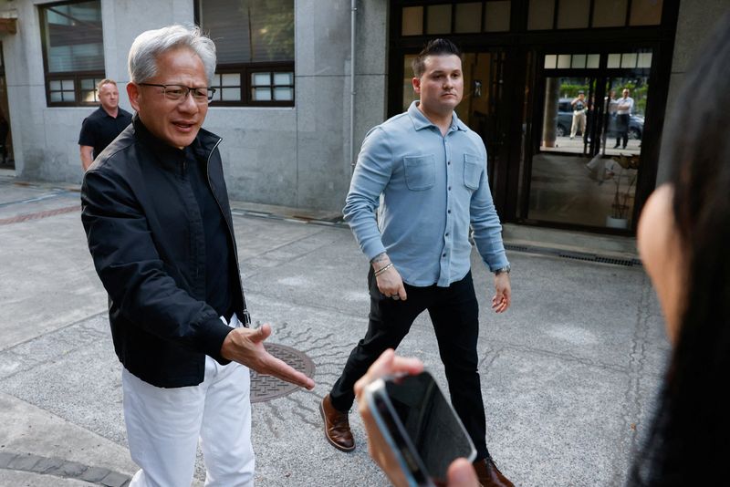 Nvidia CEO Jensen Huang arrives at a Meet-a-Claw event in Taipei, Taiwan May 23, 2026. REUTERS/Ann Wang
