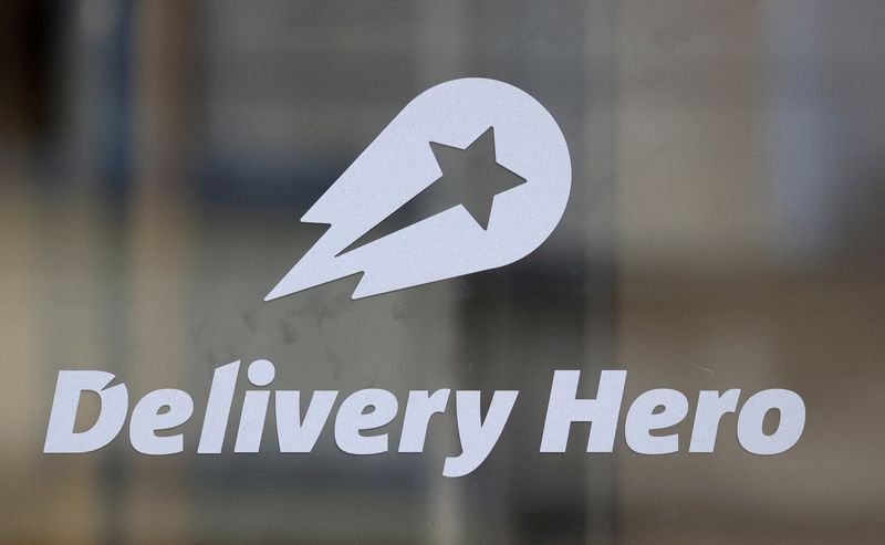 FILE PHOTO: The Delivery Hero's logo is pictured at its headquarters in Berlin, Germany, August 18, 2020. REUTERS/Fabrizio Bensch/File Photo
