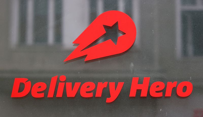 FILE PHOTO: The Delivery Hero's logo is pictured at its headquarters in Berlin, Germany, August 18, 2020. REUTERS/Fabrizio Bensch/File Photo