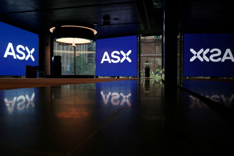 FILE PHOTO: Displays of the ASX logo at the Australian Securities Exchange in Sydney, Australia, April 22, 2026. REUTERS/Hollie Adams/File Photo