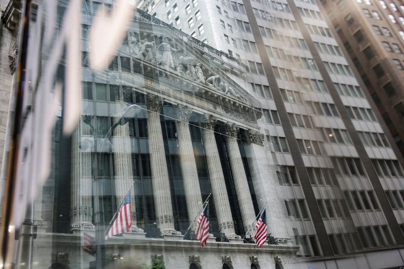 FILE PHOTO: New York Stock Exchange (NYSE) is seen though a window in New York City, U.S., May 21, 2026. REUTERS/Jeenah Moon/File Photo