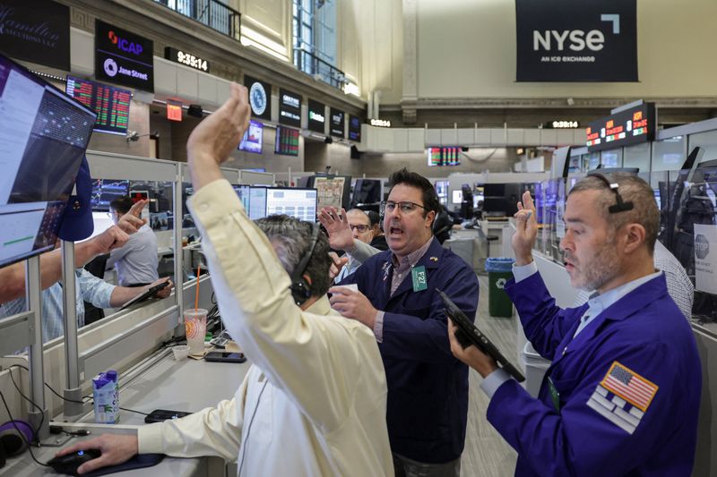 Futures-options traders work on the floor at the New York Stock Exchange's NYSE American (AMEX) in New York City, U.S., May 15, 2026. REUTERS/Jeenah Moon