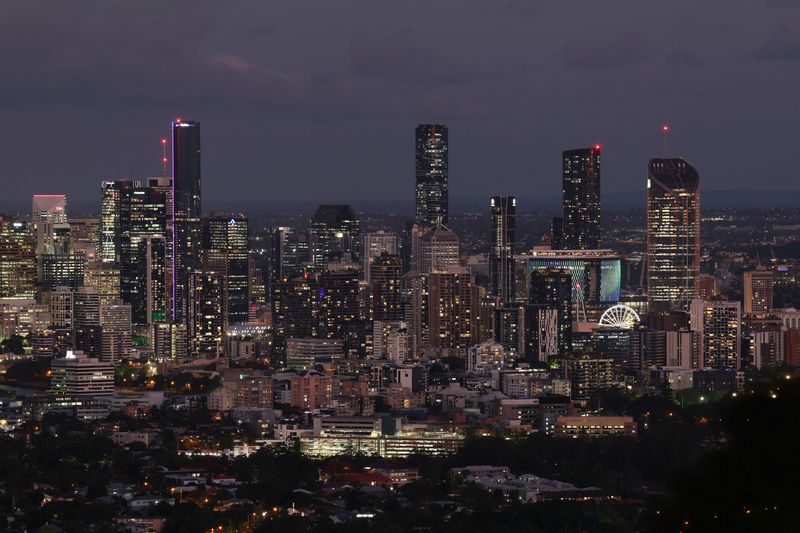 Buildings light up across city skyline at dusk in Brisbane, Australia, December 8, 2025. REUTERS/Hollie Adams