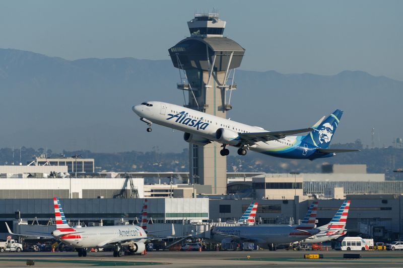 An Alaska Airlines commercial airliner takes-off from Los Angeles International Airport in Los Angeles, California, U.S., November 6, 2025. REUTERS/Mike Blake