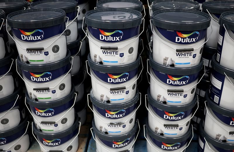 Cans of Dulux paint, an AkzoNobel brand, are seen on the shelf of a DIY retail store in Manchester, Britain, June 14, 2024. REUTERS/Phil Noble