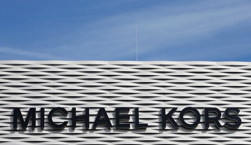 The logo of Michael Kors is seen on an outlet store in Metzingen, Germany, June 16, 2017.  REUTERS/Michaela Rehle
