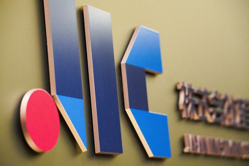 FILE PHOTO: The Japan Investment Corporation’s logo is seen at their office in Tokyo, Japan May 20, 2025. REUTERS/Miho Uranaka/File Photo