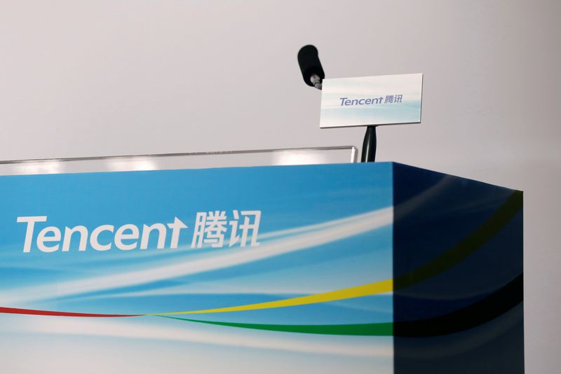 Logos of Tencent are displayed at a news conference in Hong Kong, China March 22, 2017. REUTERS/Tyrone Siu