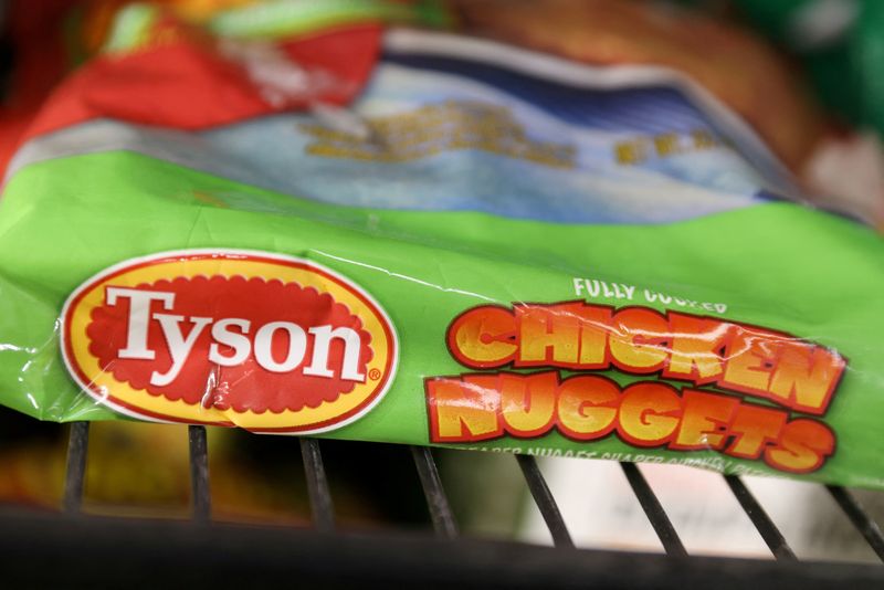FILE PHOTO: Packets of Tyson Chicken Nuggets, a brand owned by Tyson Foods, Inc., are seen in a store in Manhattan, New York, U.S., November 15, 2021. REUTERS/Andrew Kelly/File Photo