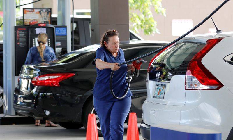 Customers fuel cars at a Costco store in Pompano Beach, Florida, U.S. August 30, 2019. REUTERS/Joe Skipper/File Photo