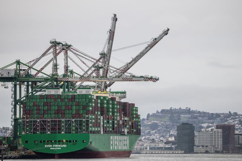 Shipping containers are stacked on a cargo ship at the port of Oakland in Oakland, California, U.S., February 24, 2026. REUTERS/Carlos Barria