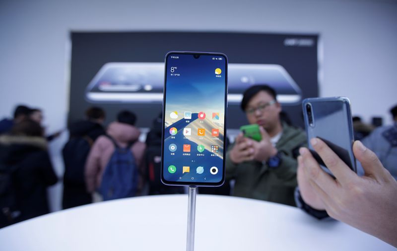 A flagship phone Xiaomi Mi 9 is displayed after its launch ceremony in Beijing, China February 20, 2019. REUTERS/Jason Lee