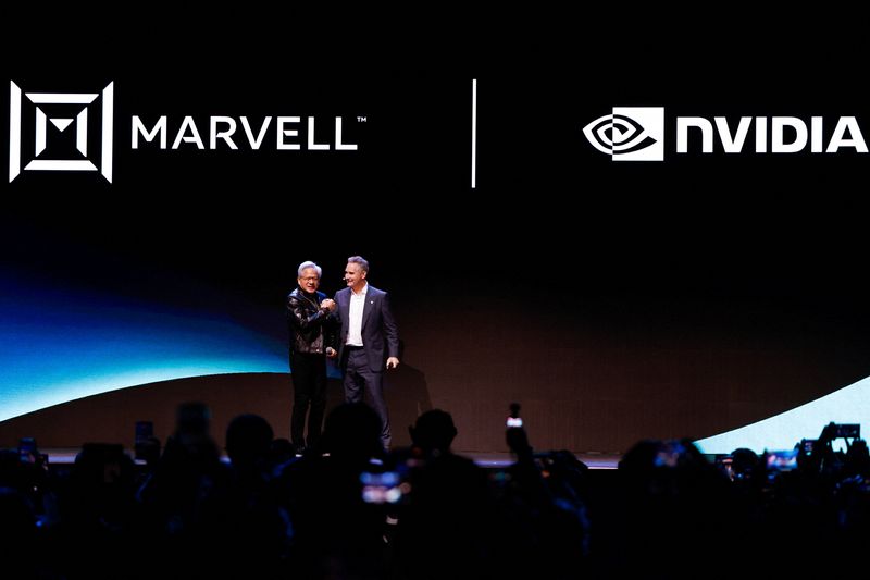Nvidia CEO Jensen Huang joins Marvell CEO Matt Murphy at a keynote speech during Computex in Taipei, Taiwan, June 2, 2026. REUTERS/Ann Wang