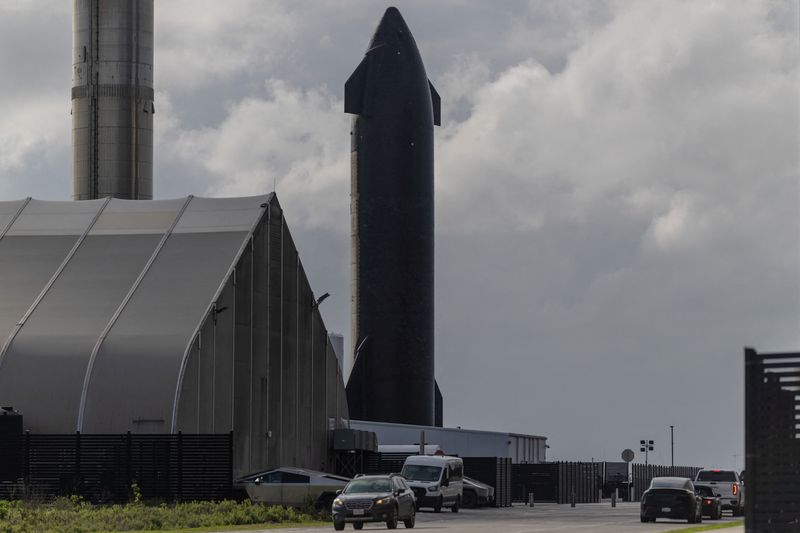 A SpaceX rocket stands as the company prepares to file for an initial public offering (IPO), in Starbase, Texas, U.S. April 22, 2026. REUTERS/Carlos Barria