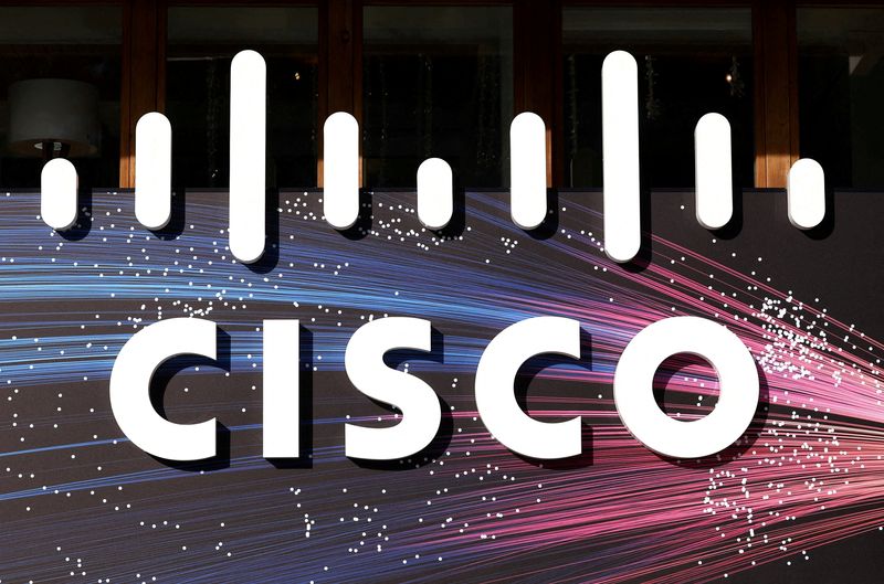 FILE PHOTO: A logo of CISCO sits outside the company's house on the opening day of the 55th annual meeting of the World Economic Forum (WEF) in Davos, Switzerland, January 20, 2025. REUTERS/Yves Herman/File Photo