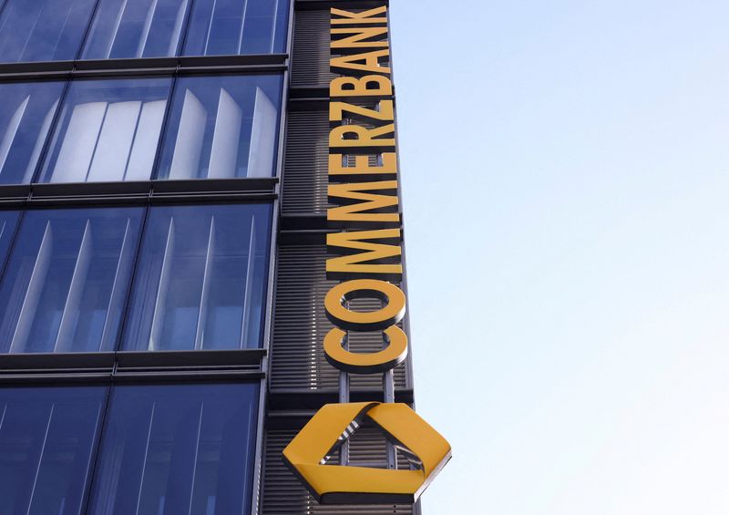 FILE PHOTO: The logo of Commerzbank at a branch as Italy's UniCredit launches an unsolicited bid to increase its stake above 30% in Commerzbank, crossing the mandatory 30% takeover threshold under German law, in Cologne, Germany, March 16, 2026. REUTERS/Thilo Schmuelgen/File Photo