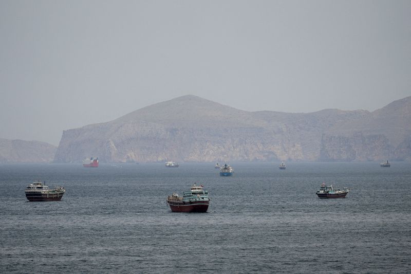 FILE PHOTO: Ships and boats in the Strait of Hormuz, Musandam, Oman, April 22, 2026. REUTERS/Stringer/File Photo