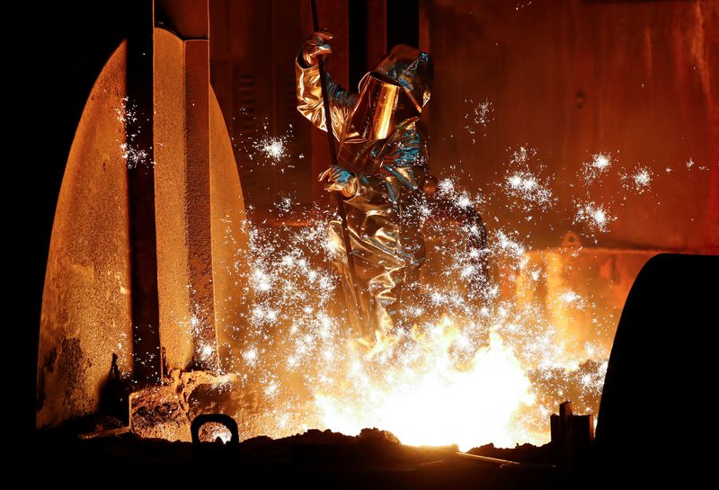 A steel worker of Germany's industrial conglomerate ThyssenKrupp AG which holds its annual shareholders meeting on Friday February 1, 2019, takes a sample of raw iron from a blast furnace at Germany's largest steel factory in Duisburg, Germany, January 28, 2019.  REUTERS/Wolfgang Rattay