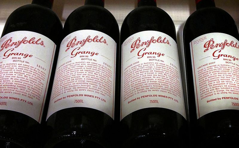 FILE PHOTO: Bottles of Penfolds Grange, made by Australian wine maker Penfolds and owned by Australia's Treasury Wine Estates, sit on a shelf for sale at a wine shop in central Sydney, Australia, August 4, 2014.   REUTERS/David Gray/File photo