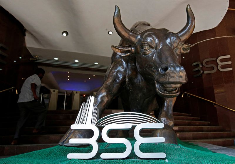 File Photo: The Bombay Stock Exchange logo is seen under a bull statue at the entrance of their building in Mumbai, India January 30, 2018. REUTERS/Shailesh Andrade/File Photo