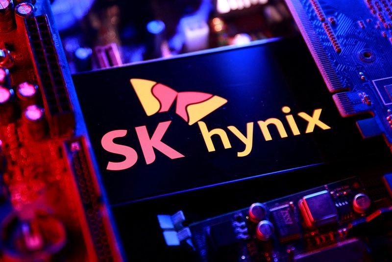 FILE PHOTO: The SK hynix logo and a computer motherboard appear in this illustration taken August 25, 2025. REUTERS/Dado Ruvic/Illustration/File Photo