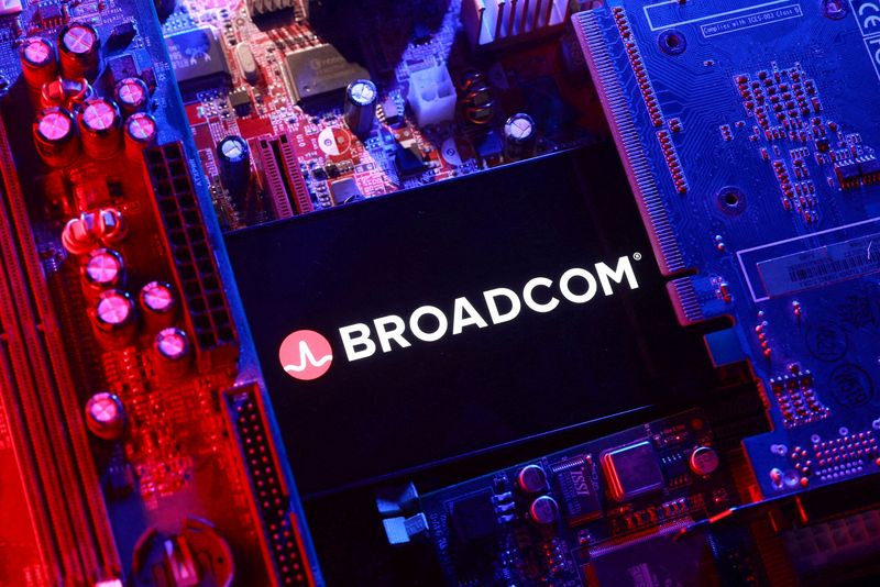 FILE PHOTO: A Broadcom logo and a computer motherboard appear in this illustration created on August 25, 2025. REUTERS/Dado Ruvic/Illustration/File Photo