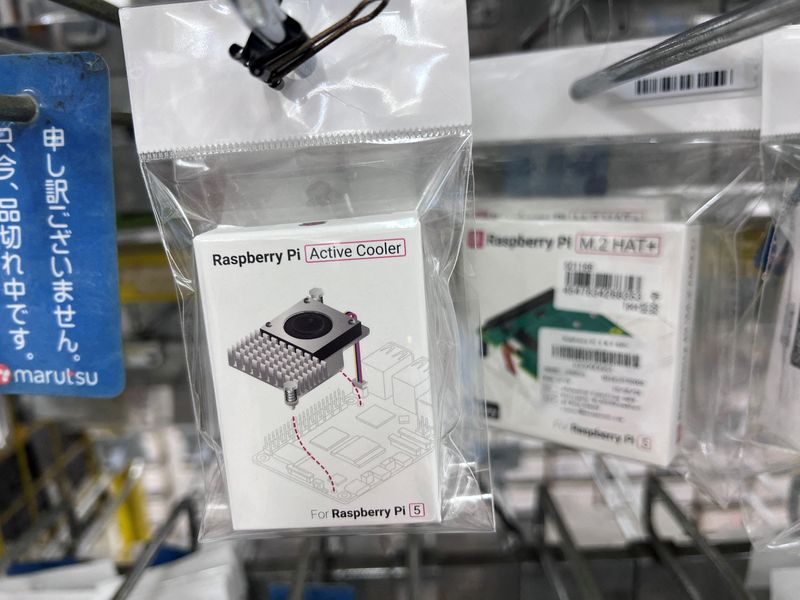 FILE PHOTO: Raspberry Pi components are displayed on shelves in an electronics shop in the Akihabara neighbourhood of Tokyo, Japan, August 17, 2025. REUTERS/Suzanne Plunkett/File Photo