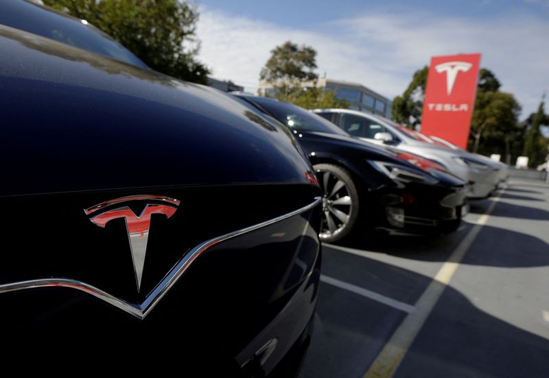 FILE PHOTO: A Tesla Model X is photographed alongside a Model S at a Tesla electric car dealership in Sydney, Australia, May 31, 2017.  REUTERS/Jason Reed/File Photo