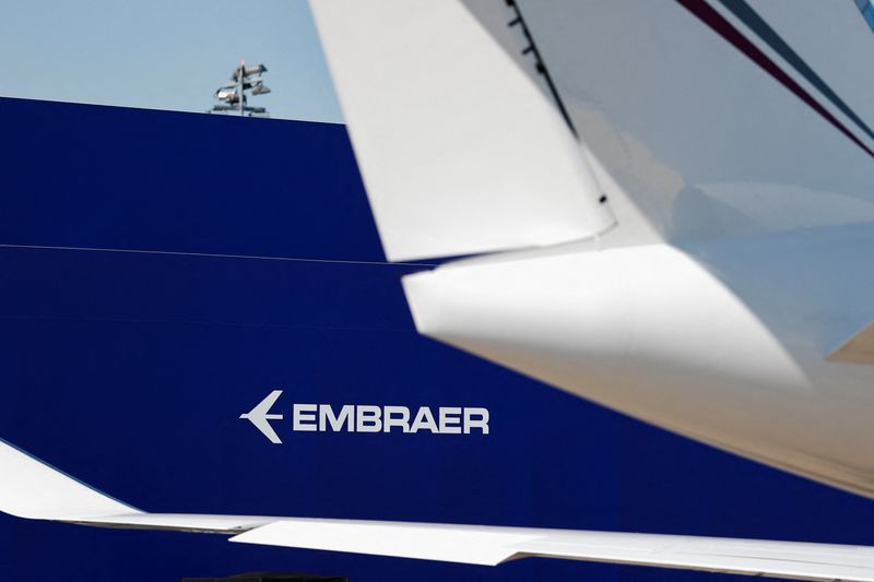 A logo of Embraer is seen at the 55th International Paris Airshow at Le Bourget Airport near Paris, France, June 17, 2025. REUTERS/Benoit Tessier