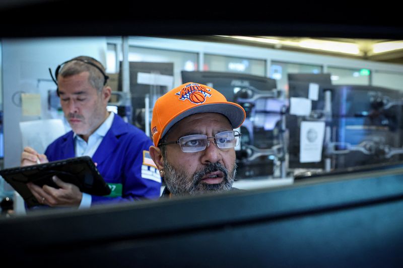 Futures-options traders work on the floor at the New York Stock Exchange's NYSE American (AMEX) in New York City, U.S. June 8, 2026.  REUTERS/Brendan McDermid