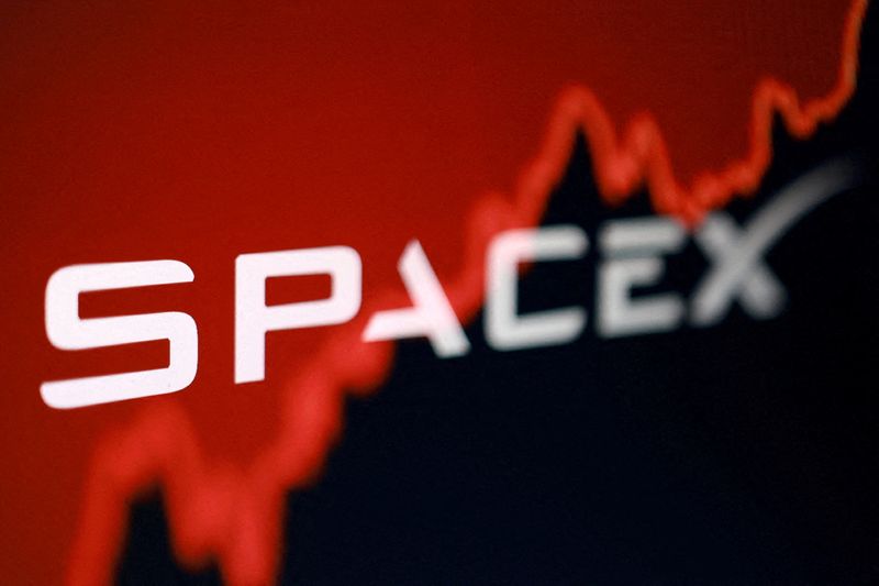 FILE PHOTO: The SpaceX logo and a rising stock graph are seen in this illustration created on June 5, 2026. REUTERS/Dado Ruvic/Illustration/File Photo