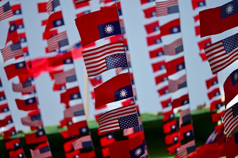 U.S. and Taiwanese flags are seen in San Francisco, California, January 28, 2026. REUTERS/Stephen Nellis