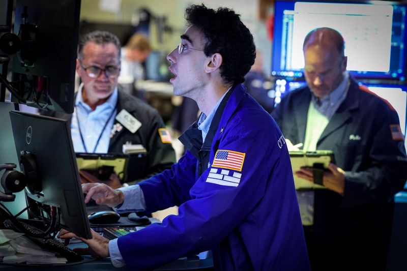 Traders work on the floor at the New York Stock Exchange (NYSE) in New York City, U.S., June 8, 2026.  REUTERS/Brendan McDermid