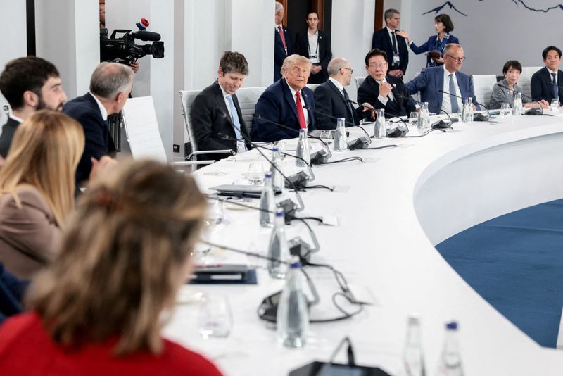 U.S. President Donald Trump, OpenAI CEO Sam Altman, Google DeepMind CEO Demis Hassabis, South Korea's President Lee Jae Myung, Germany's Chancellor Friedrich Merz and Japan's Prime Minister Sanae Takaichi attend a working lunch with G7 leaders, G7 outreach partners and global tech CEOs on innovation and AI during the G7 Summit in Evian-les-Bains, France, June 17, 2026.REUTERS/Evelyn Hockstein