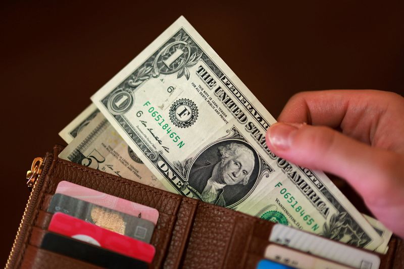 U.S. dollar banknotes are seen in this illustration taken March 24, 2026. REUTERS/Dado Ruvic/Illustration