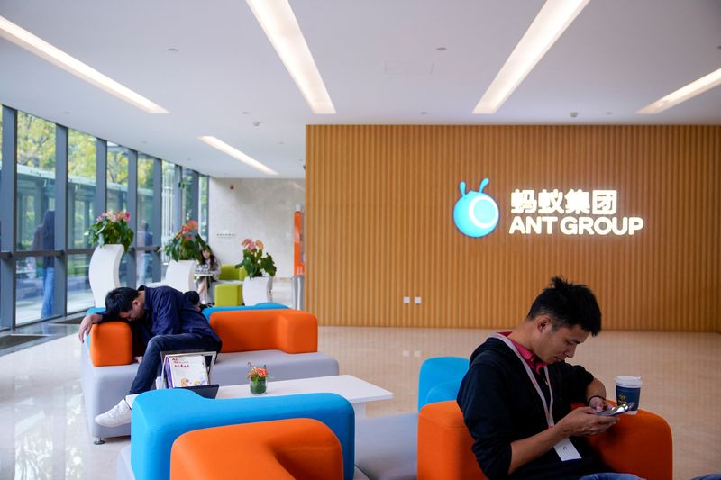 FILE PHOTO: A logo of Ant Group is pictured at the headquarters of Ant Group, an affiliate of Alibaba, in Hangzhou, Zhejiang province, China October 29, 2020. REUTERS/Aly Song/File Photo