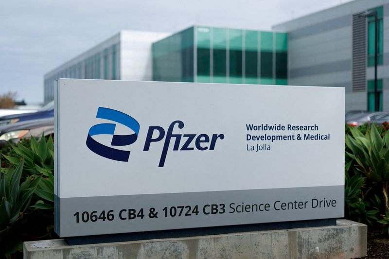 FILE PHOTO: A Pfizer logo is shown at a research facility in the La Jolla neighborhood of San Diego, California, U.S., September 30, 2025. REUTERS/Mike Blake/File Photo