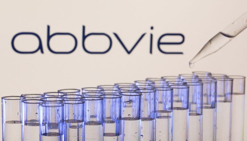 FILE PHOTO: Test tubes are seen in front of a displayed Abbvie logo in this illustration taken, May 21, 2021. REUTERS/Dado Ruvic/Illustration/File Photo