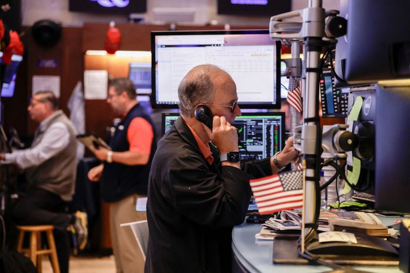 A trader works on the floor at the New York Stock Exchange (NYSE) in New York City, U.S., June 18, 2026. REUTERS/Jeenah Moon