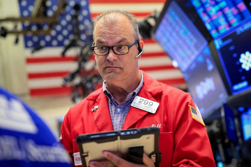 Traders work on the floor at the New York Stock Exchange (NYSE) in New York City, U.S., June 22, 2026.  REUTERS/Brendan McDermid