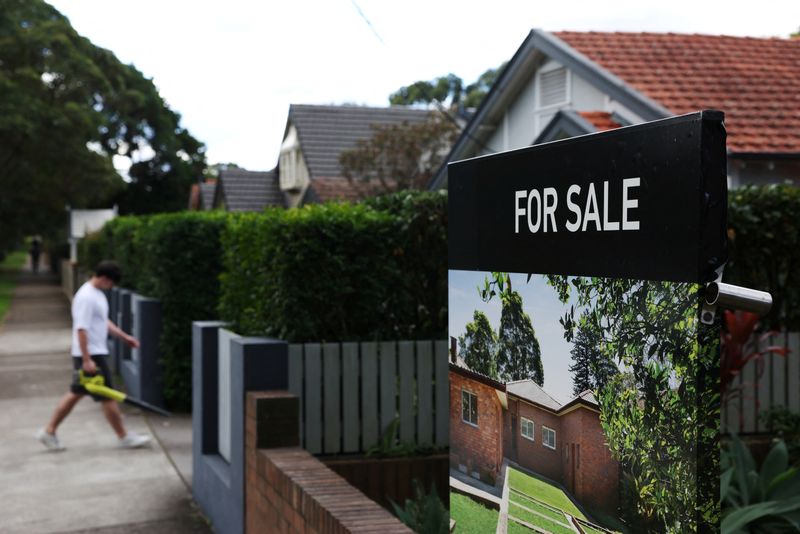 An 'For Sale' sign stands outside a property in Sydney, Australia, June 22, 2026. REUTERS/Hollie Adams