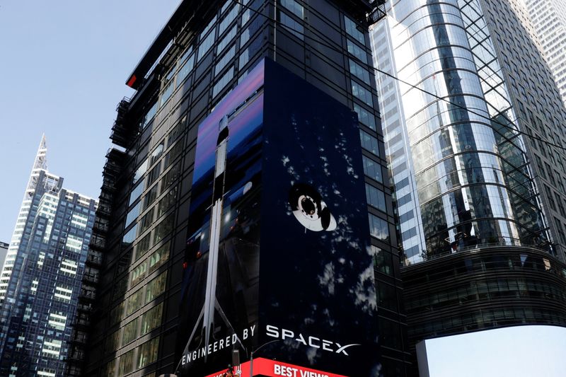 A sign displays outside Nasdaq on the day of SpaceX's initial public offering (IPO) in New York City, U.S., June 12, 2026. REUTERS/Jeenah Moon