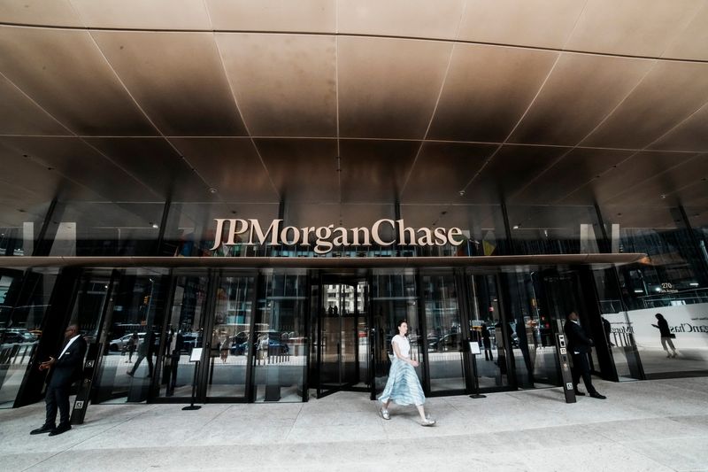 People exit the JPMorgan Chase & Co., headquarters in New York City, U.S., April 1, 2026. REUTERS/Eduardo Munoz