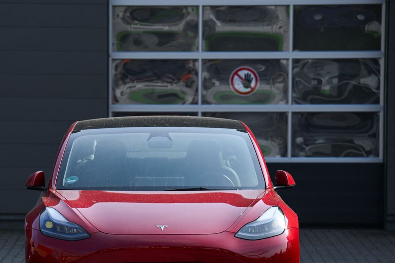A Tesla electric vehicle is parked at a Tesla dealership, after Tesla, Inc. released its financial results for the first quarter of 2025, in Berlin, Germany April 23, 2025. REUTERS/Annegret Hilse