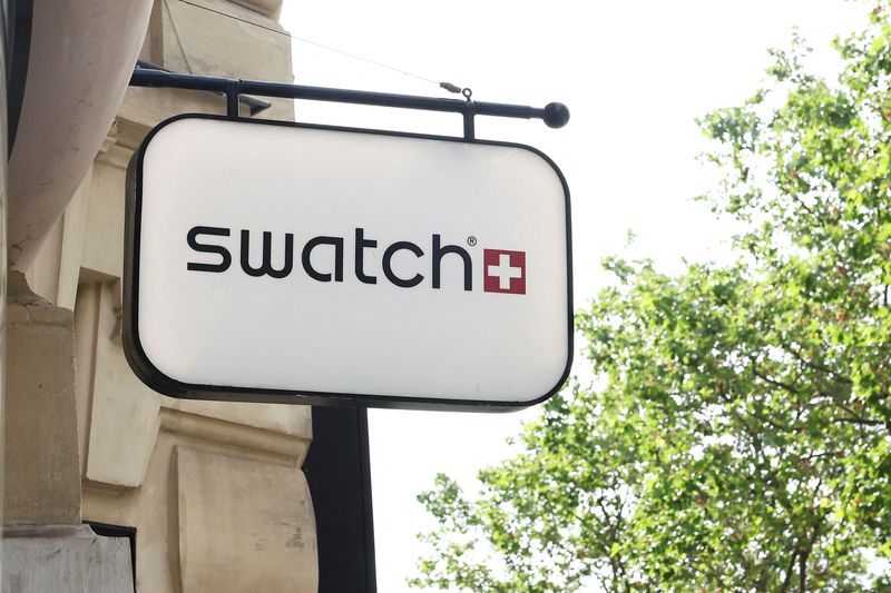 The logo of Swiss watch manufacturer Swatch is displayed outside a store in Paris, France, May 18, 2026. REUTERS/Alice Sacco