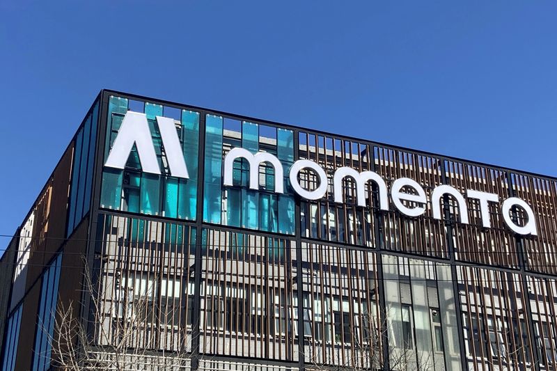 FILE PHOTO: The company logo of Chinese autonomous driving startup Momenta is seen on the facade of its office building in Beijing, China March 13, 2020. Picture taken March 13, 2020. REUTERS/Yilei Sun/File Photo