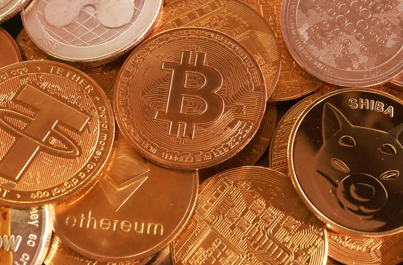 Representation of cryptocurrencies are seen in this illustration taken September 10, 2025. REUTERS/Dado Ruvic/Illustration