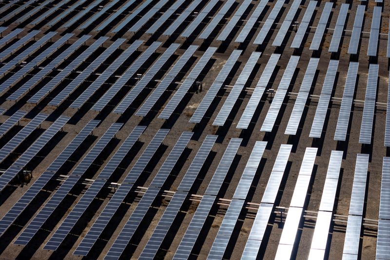 A drone view of sunlight reflecting off solar panels at the Boulder Solar 1 facility in Boulder City, Nevada, U.S., November 23, 2025. REUTERS/Daniel Cole